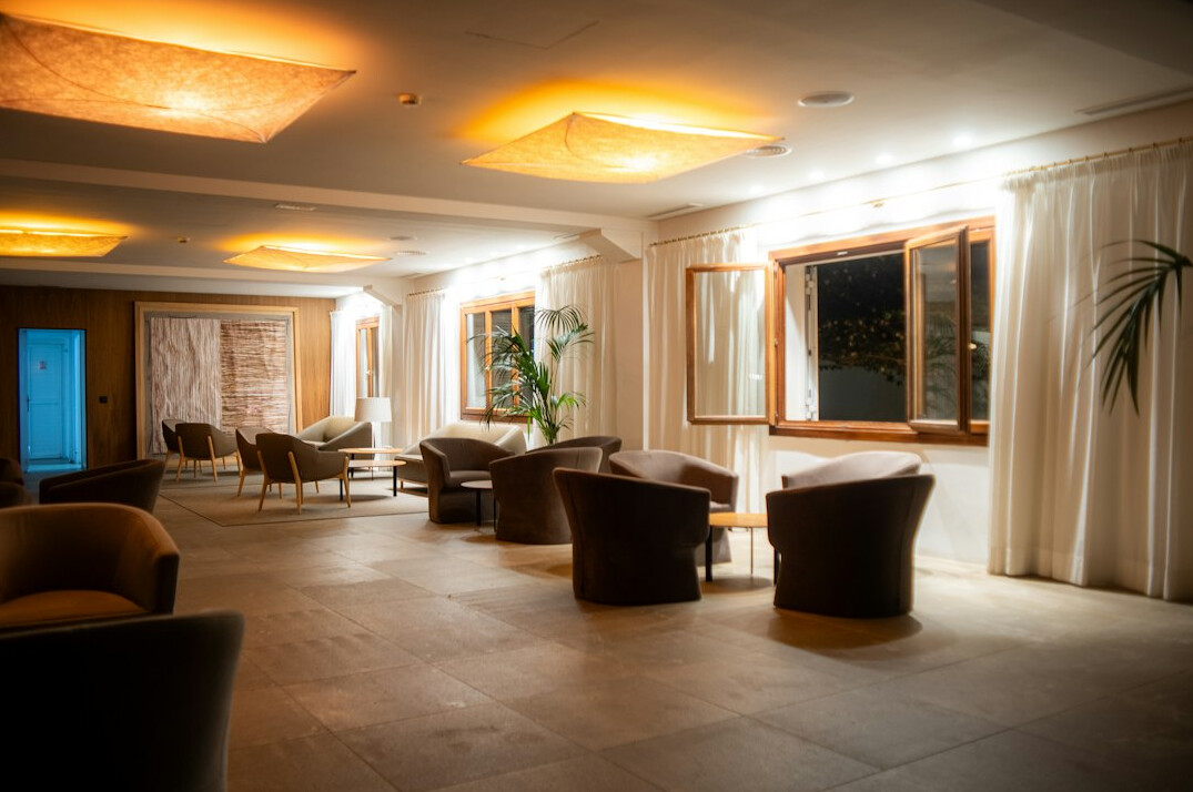 Elegant VIP lounge with warm ambient lighting