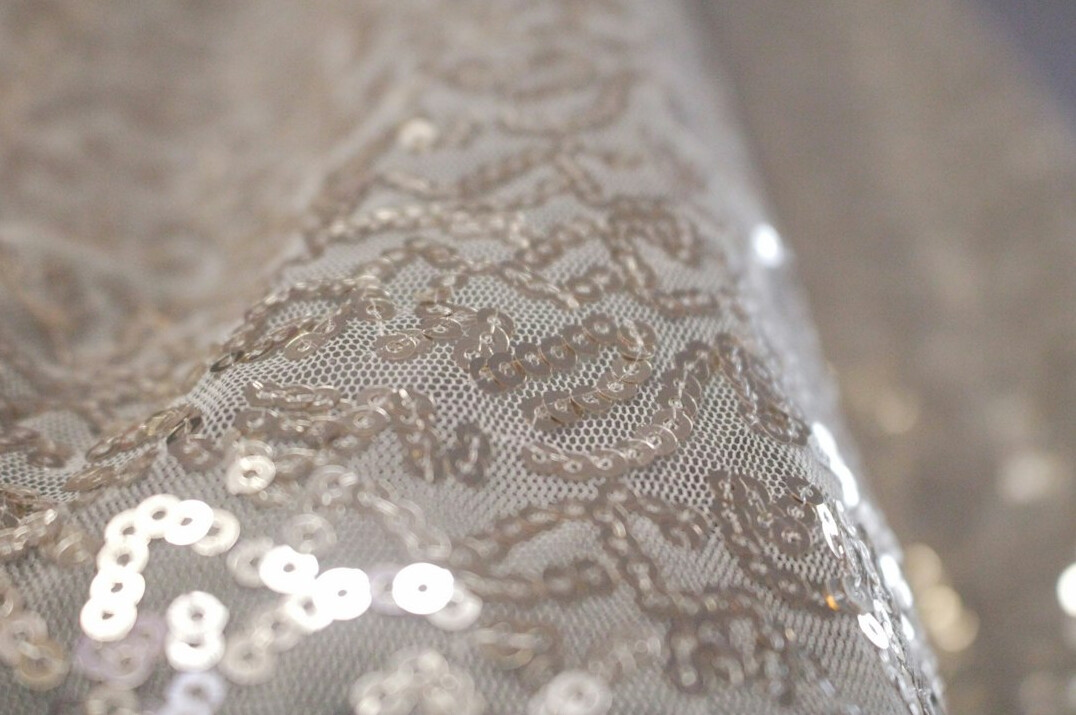 Detail of an elegant evening gown fabric