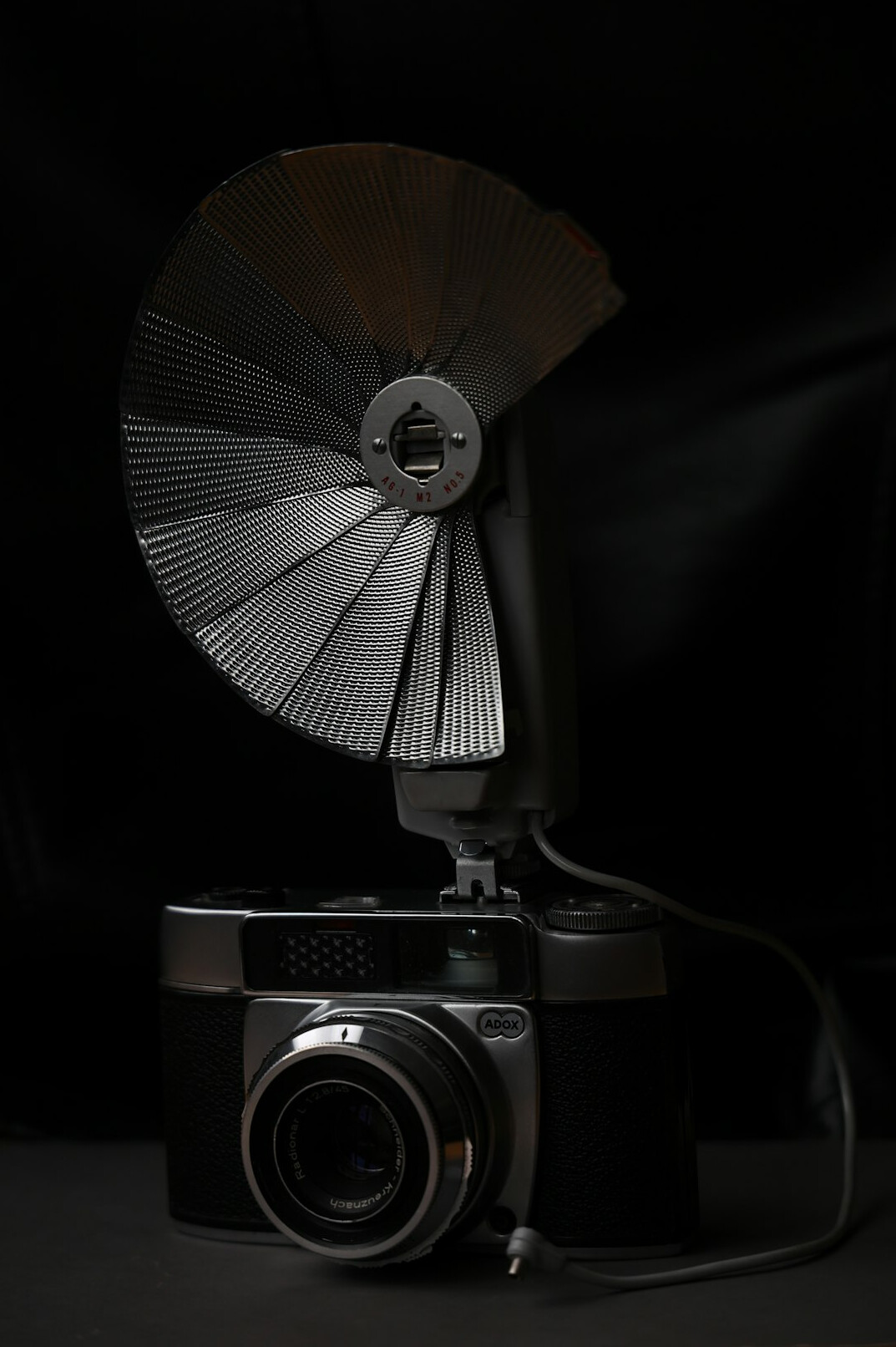 Camera flash capturing a bright burst of light