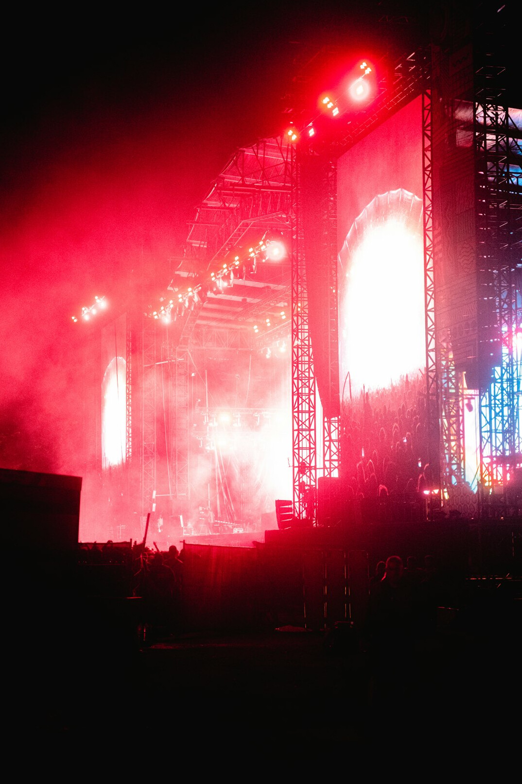 Concert stage with colorful lights and haze